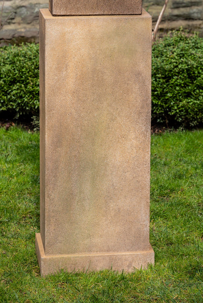 Light brown square pedestal shown on lawn