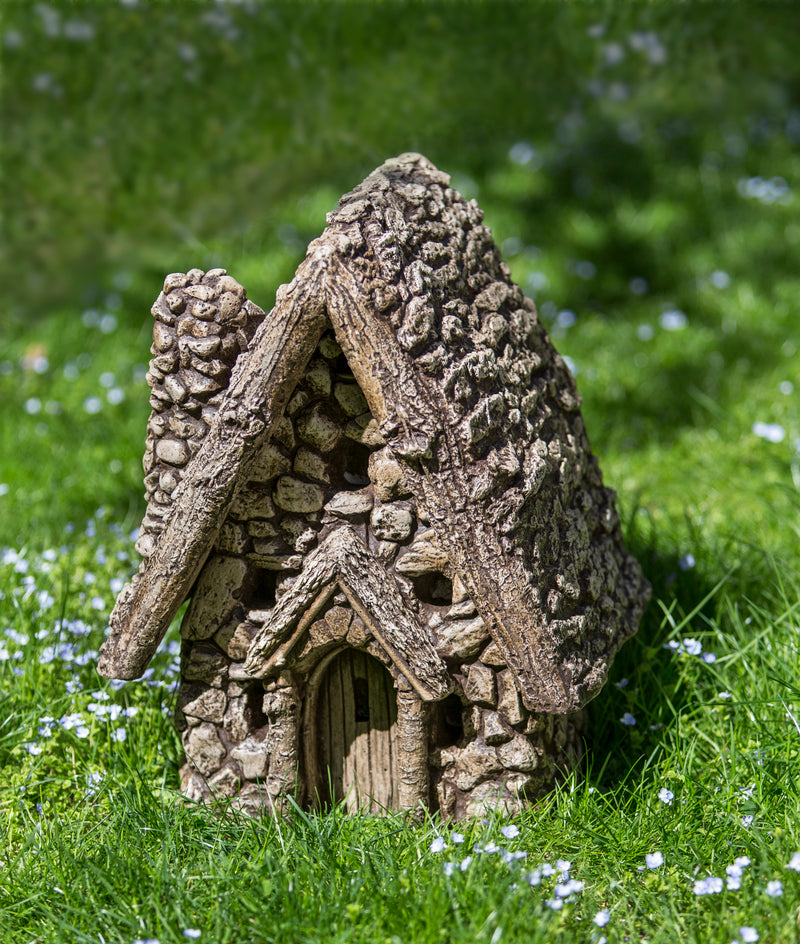 Brown little gnome house with chimney and door