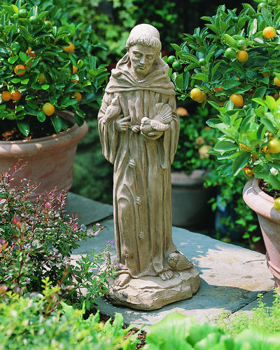 Saint Francis on small plinth holding a bird