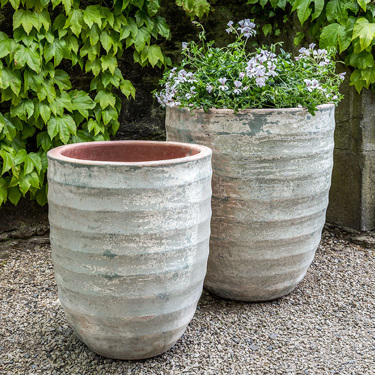 Set of 2 containers shown on gravel patio
