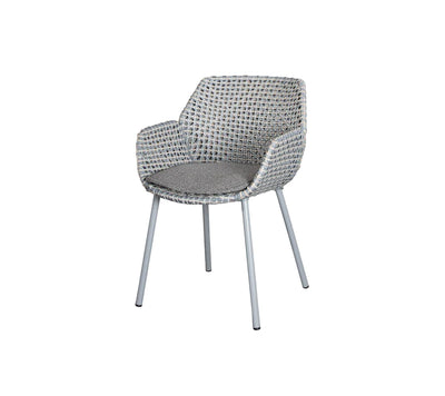 Light grey armchair on white background