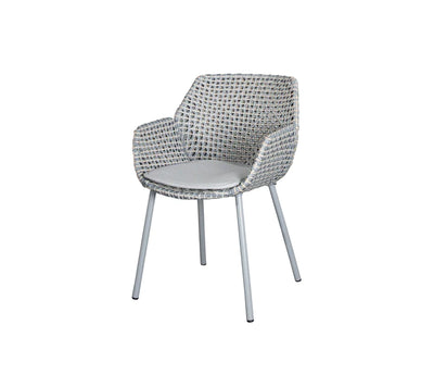 Light grey armchair on white background