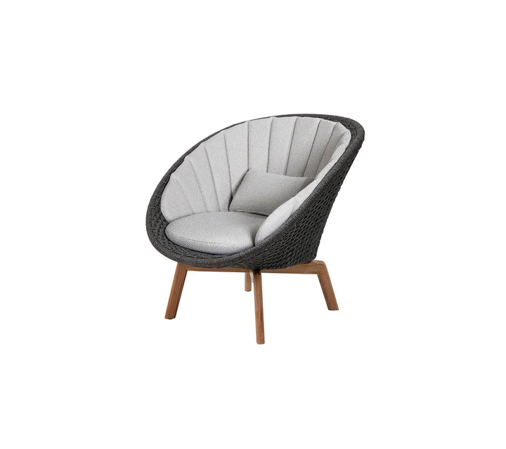 Black armchair with gray cushions on white background