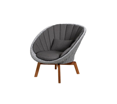 Gray armchair with black cushions on white background