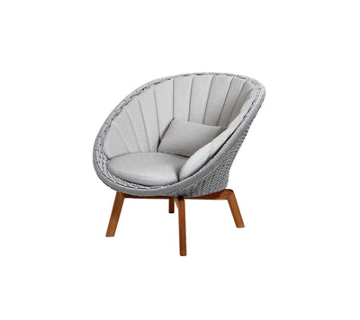 Gray armchair with gray cushions on white background