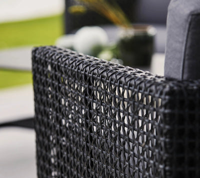 Close up of woven armchair
