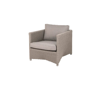 Grey armchair with matching cushion on white background
