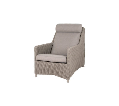Outdoor highback armchair with matching cushions  on white background