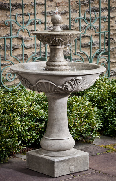 Two-tiered fountain with acanthus design on exterior of both bowls and finial top