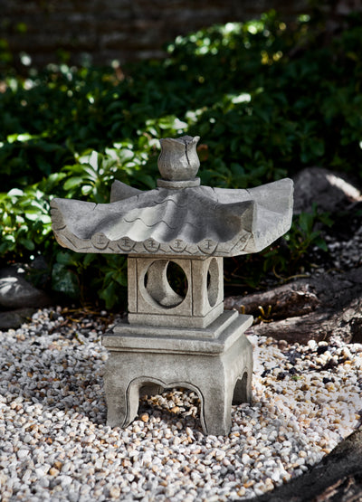 Asia-inspired gray pagoda on gravel