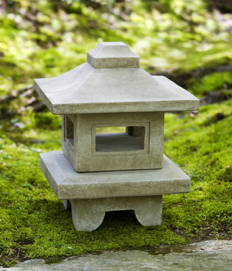 Asia-inspired lantern sitting on moss