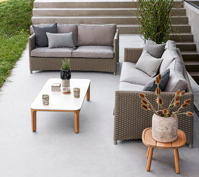 Deep seating set in front of outdoor steps