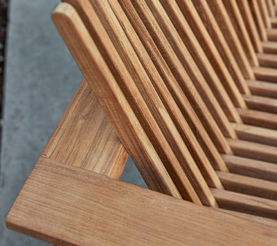 Close up of teak armchair detail