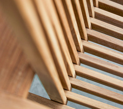 Close up of teal armchair back slats