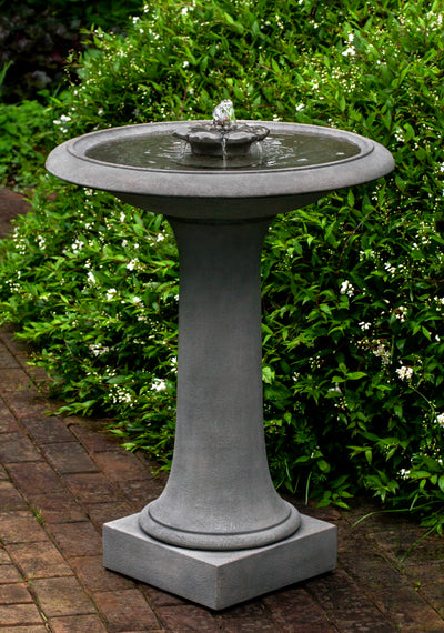 Birdbath fountain with square plinth and camellia shaped spout and water spilling out