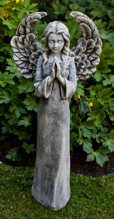 Standing praying angel with spread wings