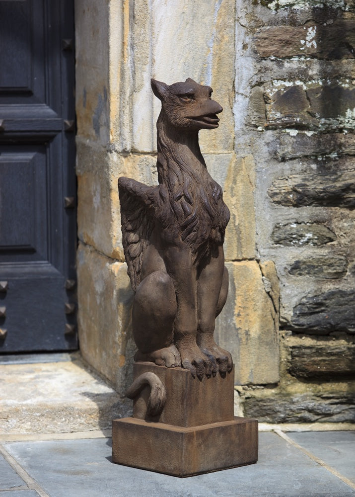 Standing gryphon on a square pedestal
