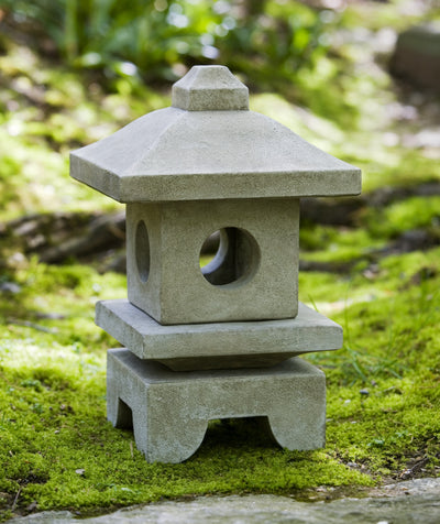 Asia-inspired lantern on top of moss