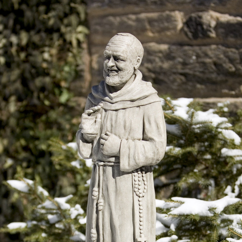 Padro Pio close up in front of snow background