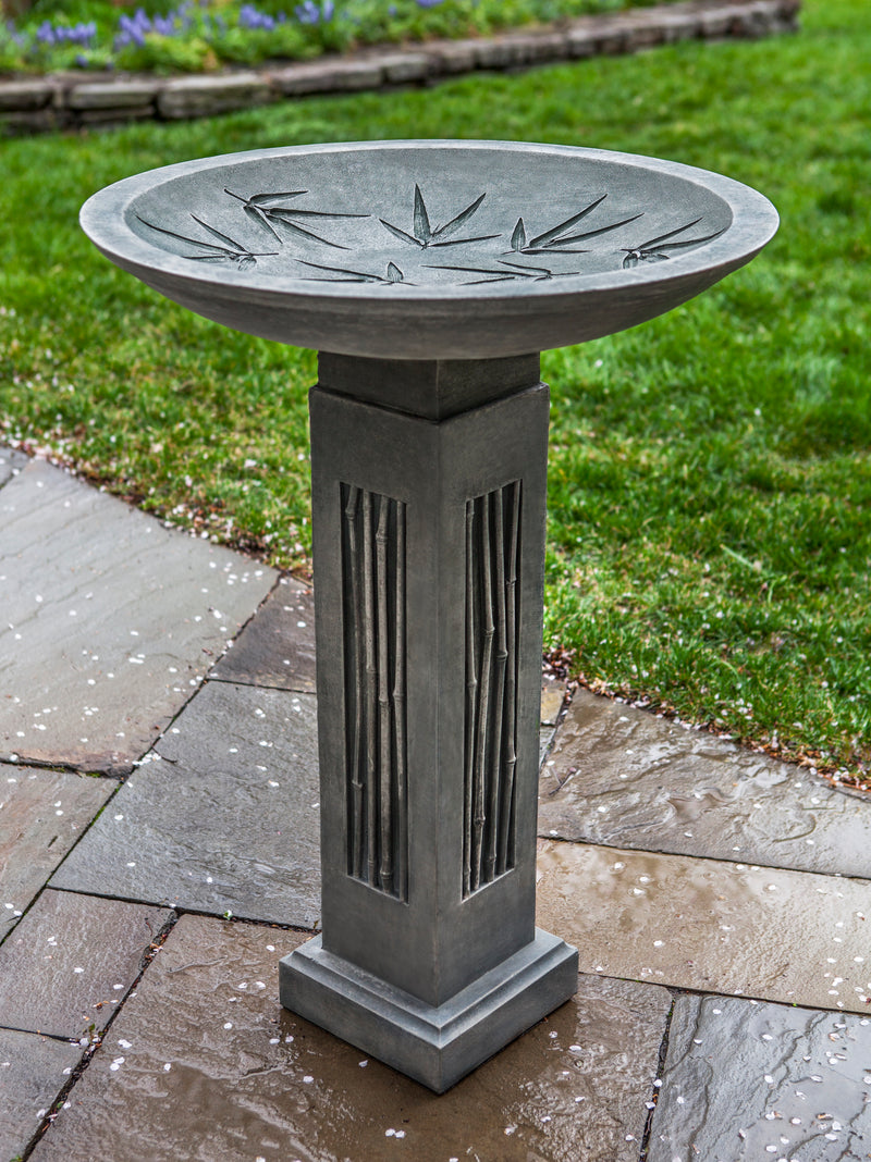 Round bowl birdbath with square pedestal, with etched bamboo leaves in bowl