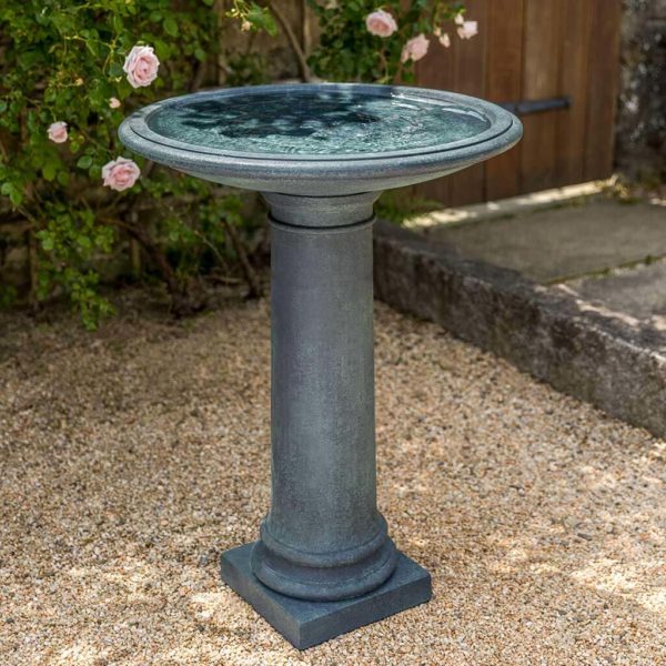 Slate gray birdbath with round bowl and square plinth