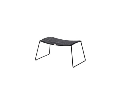 Outdoor black woven footstool on white background