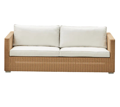 Sofa with white cushions on white background