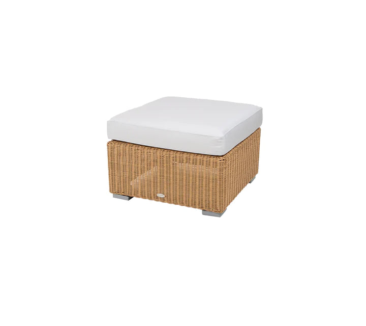 Woven outdoor footstool with white cushion