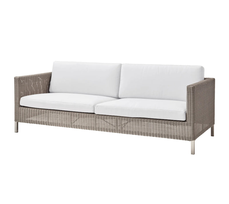 Sofa with white cushions on white background