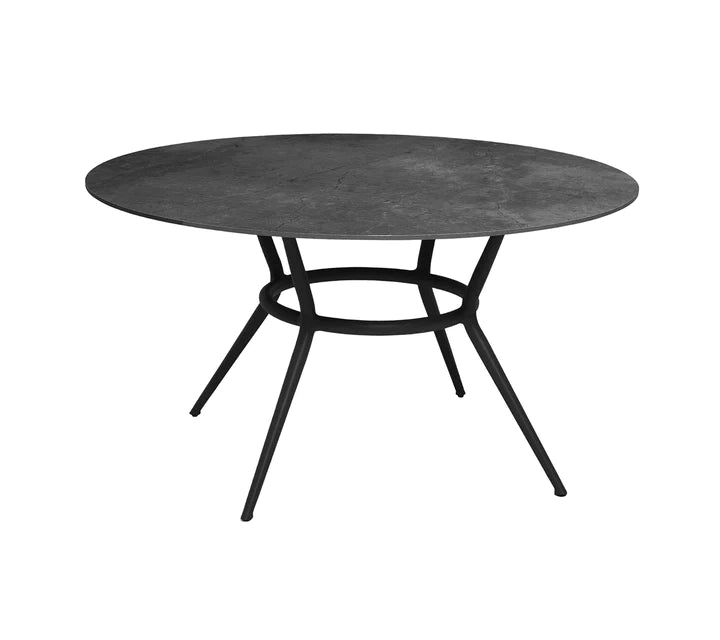 Black round table on white background