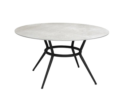 Light grey top round table on white background