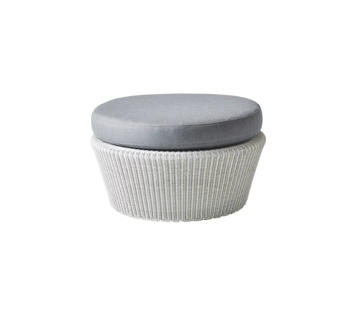 White woven footstool with gray cushion