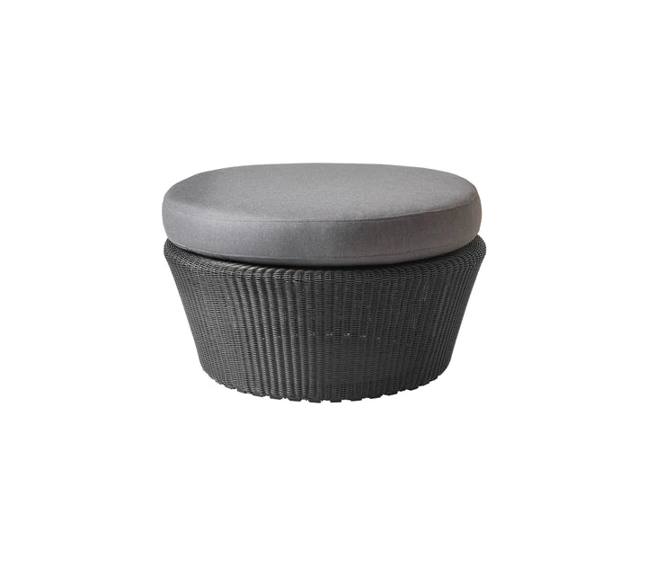 Black woven footstool with gray cushion