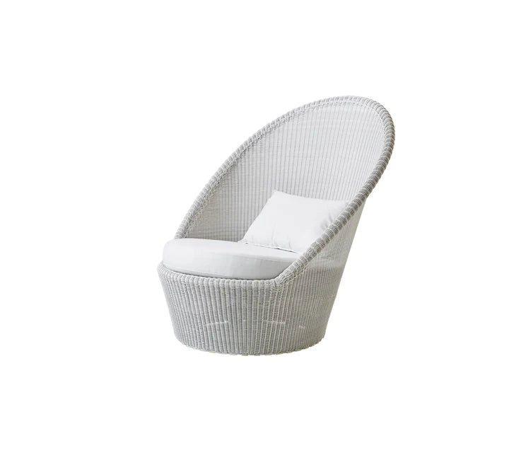 White high back armchair with white cushions shown on white background