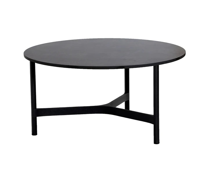 Black round coffee table on white background