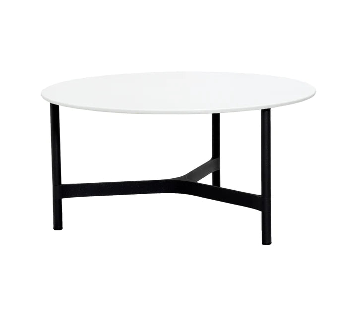White top coffee table with black legs on white background