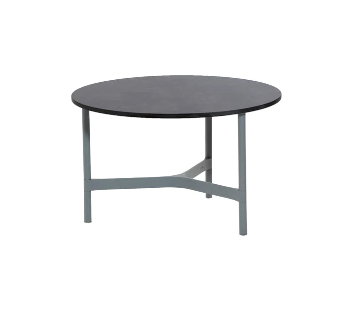 Black round coffee table on white background
